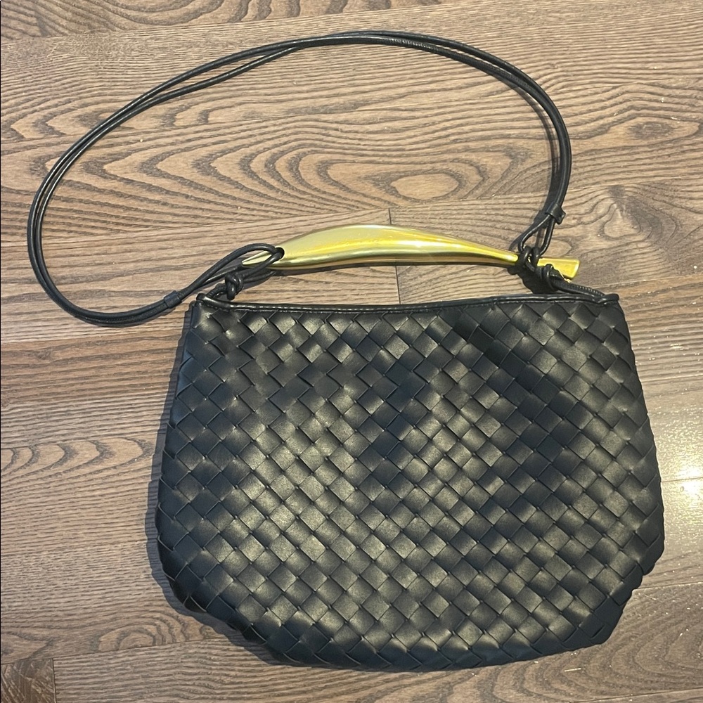 Stylish Black Woven Shoulder Bag with Unique Handle